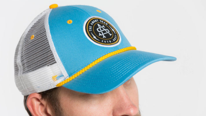 Product: "Captain's Hat" Snapback Hat // Description: Low Poriflel mesh snapback hat with embroidered logo patch // Color: Light Blue // Brand: The Angry Seas Clothing