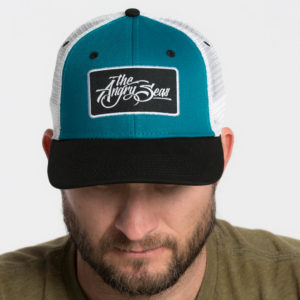 Product: "Ture Script" Snapback Hat // Description: Semi-Curved Bill mesh snapback hat with woven label appliqué // Color: Teal on White // Brand: The Angry Seas Clothing