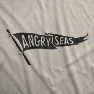 Product: "Black Flag" 50/50 T-Shirt // Description: Angry Seas tee with raise the flag silkscreened design // Color: Sand // Brand: The Angry Seas Clothing